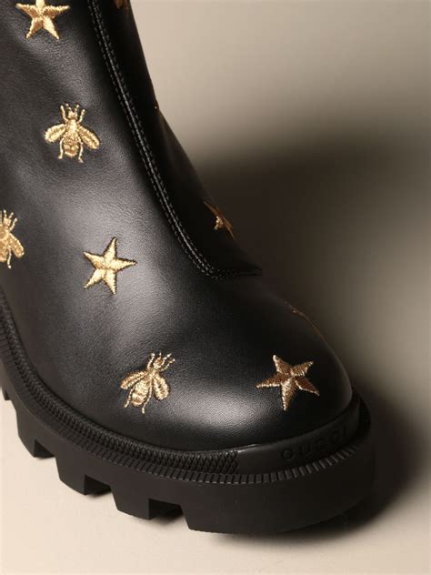 gucci boots with bees.